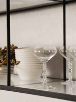 Elevate Your Entertaining with the Carat Coupe Set of 2 – Modern Cut Crystal Elegance Orrefors