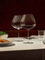 Elevate Your Sipping Experience with the Orrefors Kosta Boda Wine Glass Set - Set of 4