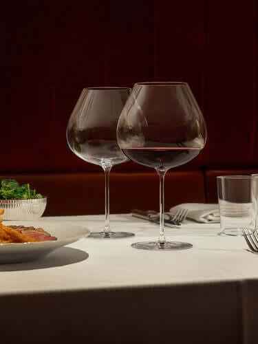 Elevate Your Sipping Experience with the Orrefors Kosta Boda Wine Glass Set - Set of 4