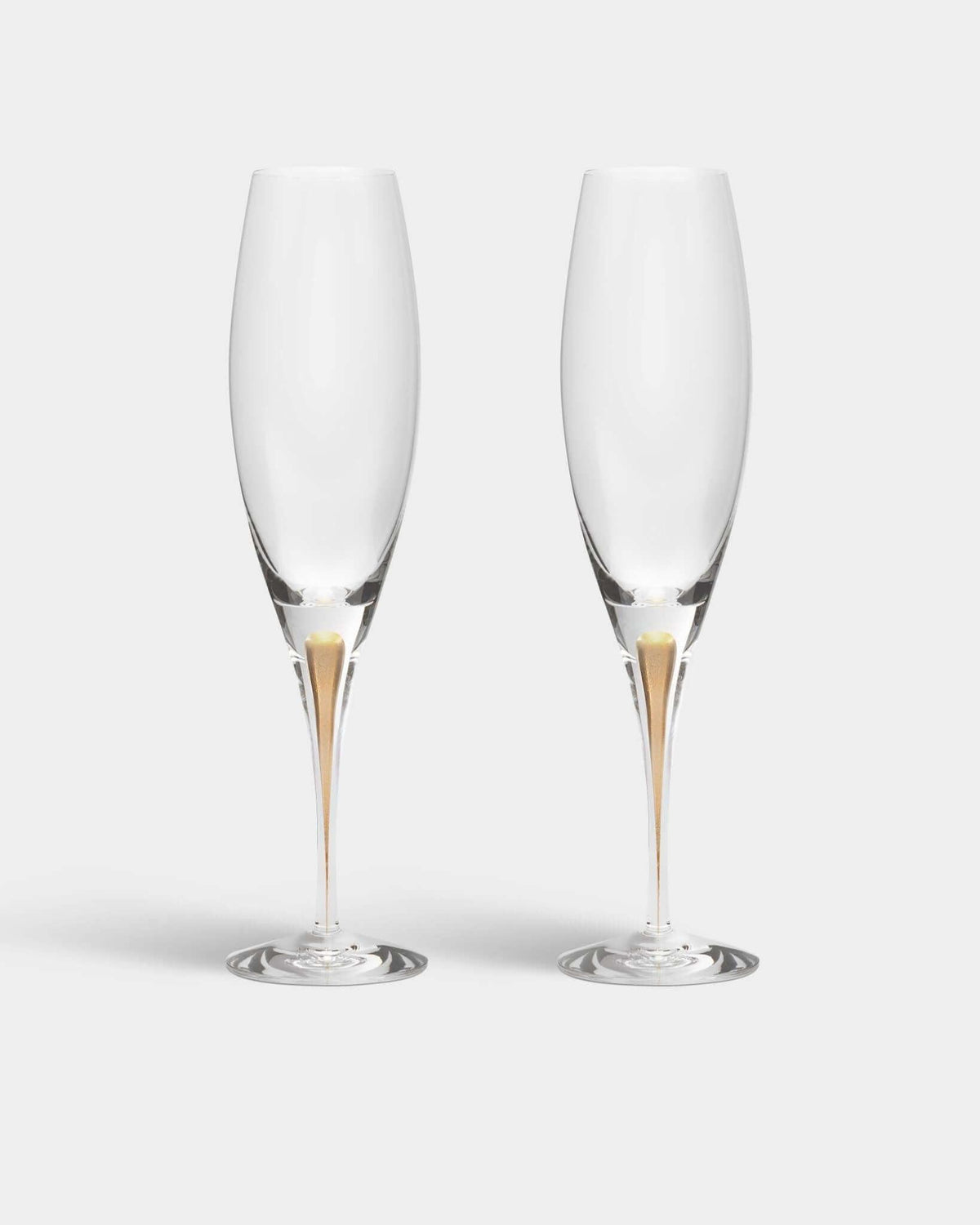Orrefors Intermezzo Gold Champagne Flutes (7oz): Celebrate in Style at Resonant OrreforsSTEMWAREChampagne GlassesGLASSWARE